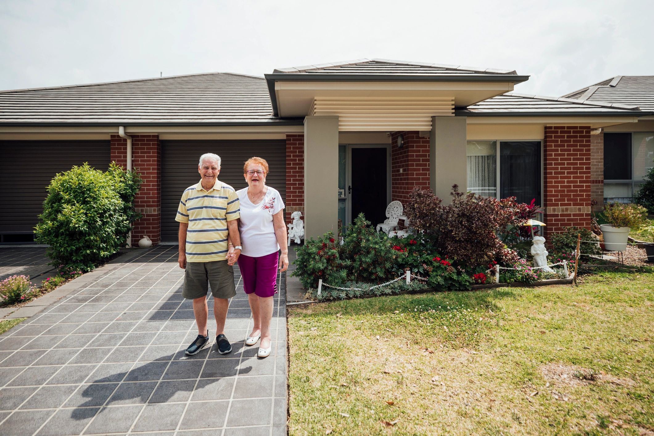 happy Australian homeowners solar energy