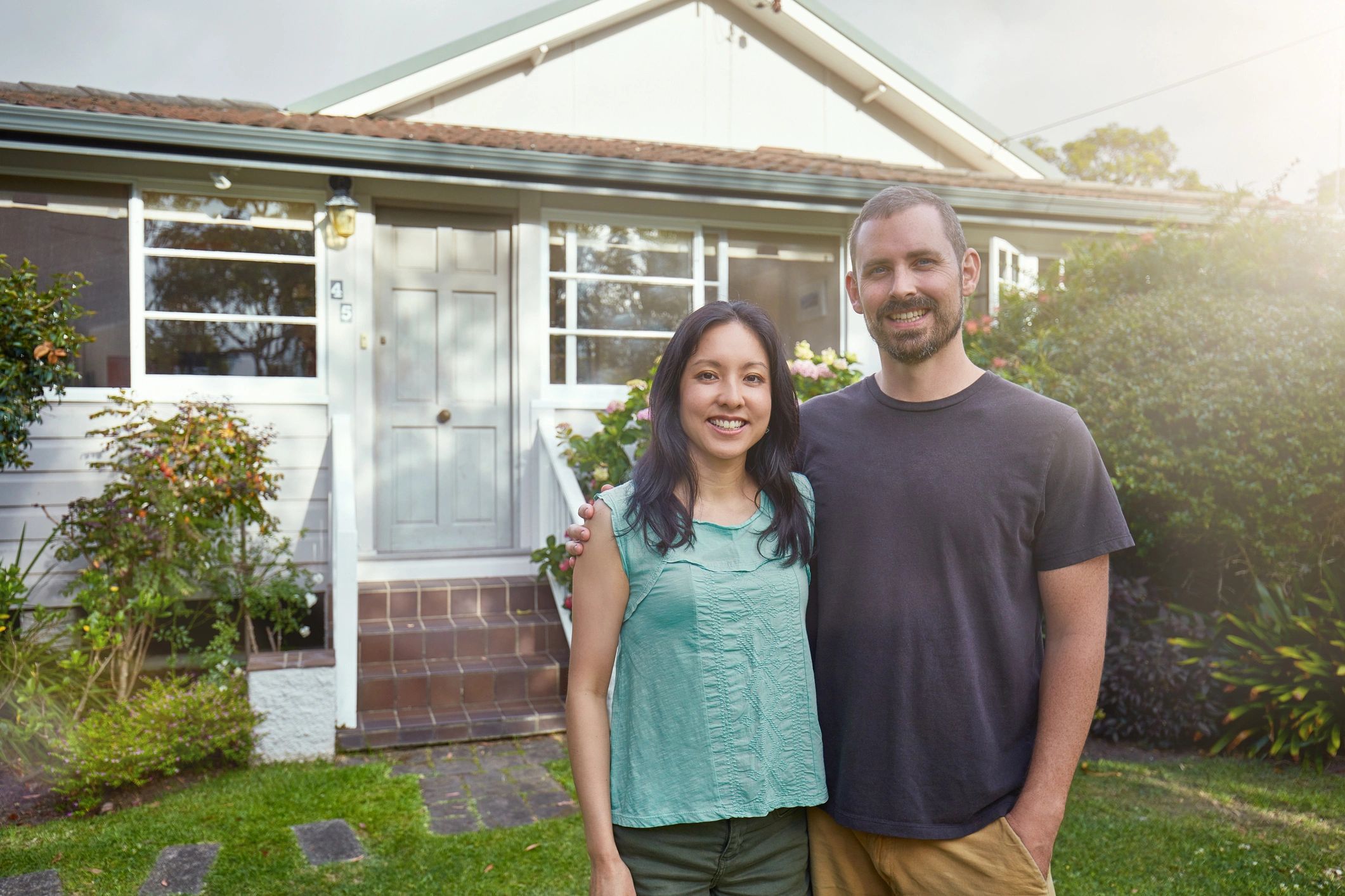 happy Australian homeowners solar energy